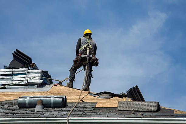 Professional Roofing technician working in Amherst, NE